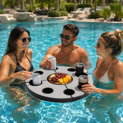 Friends around the round floating table in the pool